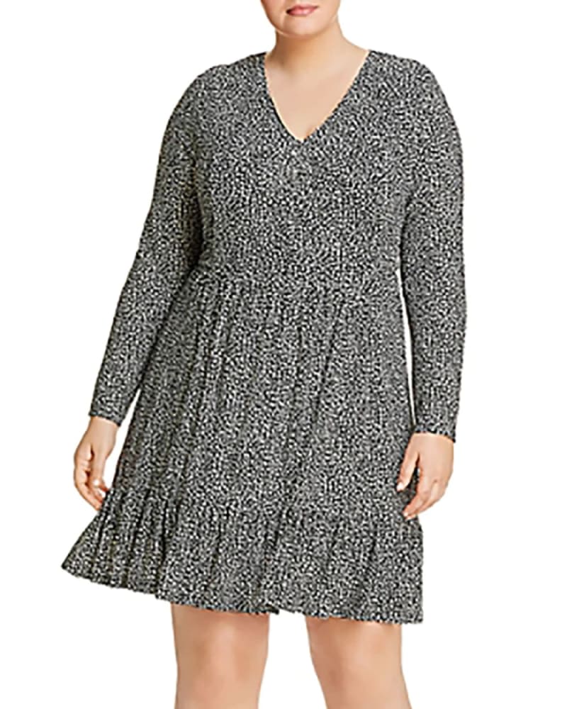 Front of a model wearing a size 1X Michael Kors Women's Plus Animal Print V-Neck Dress White Size 1X in White by Michael Kors. | dia_product_style_image_id:313373